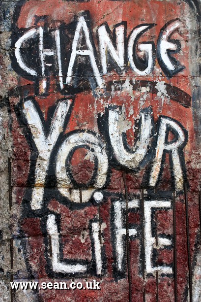 Photo of 'Change Your Life' slogan in London, UK