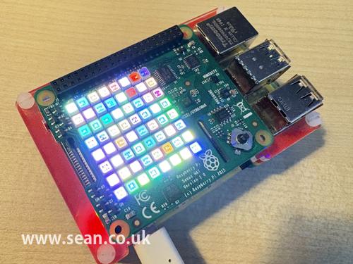 Raspberry Pi wth Sense HAT and the LEDs showing random colours