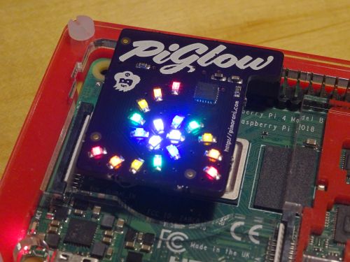 The PiGlow add on board, with three spirals of six LEDs illuminated.